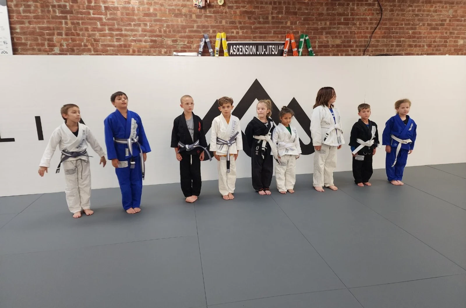Kids learning sportsmanship through martial arts